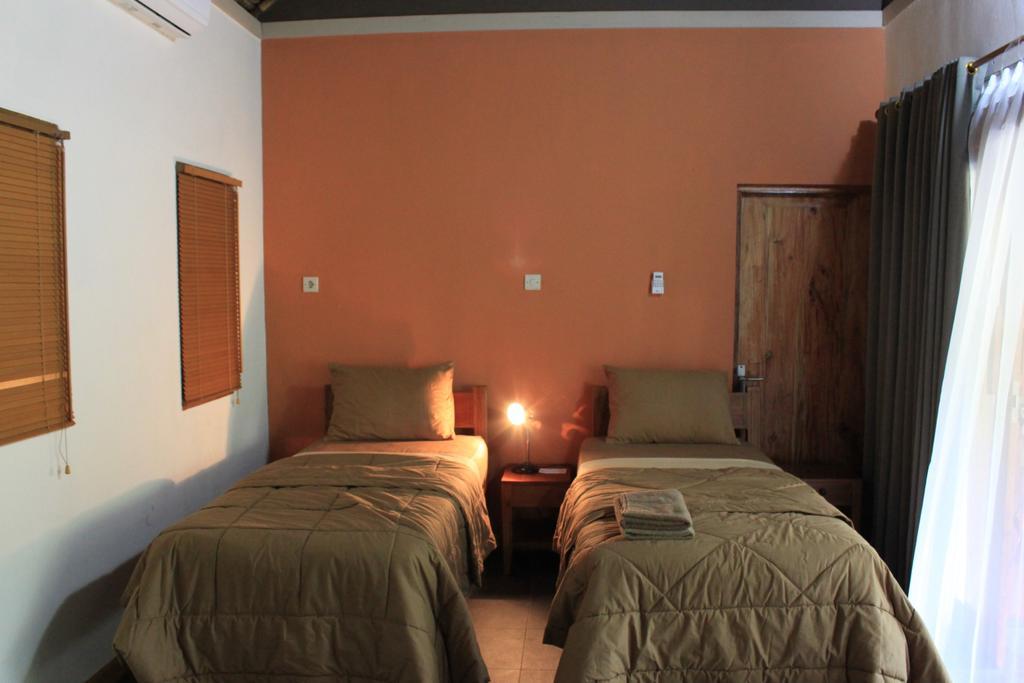 Kuta  Albany Home Stay חדר תמונה